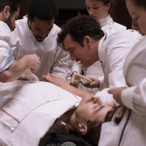 Still of Clive Owen and André Holland in The Knick (2014)