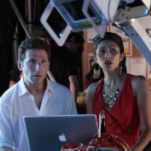 Still of Mark Feuerstein and Reshma Shetty in Royal Pains: Bottoms Up (2012)