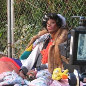 Sophisticated Homeless Woman on the set of JaRules video Father Forgive Me