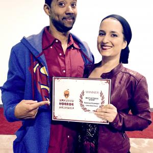 Chris Greene with Actress Vanessa Aranegui at the Florida Horror Film Festival as she wins Best Actress 2014 for Unbridled Chaos, a short film Directed by Chris.