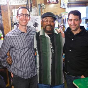 Moonshine  Mojo Hands web series coproducers Roger Stolle L and Jeff Konkel R with bluesmanfolk arts James Super Chikan Johnson during Clarksdale Mississippi filming