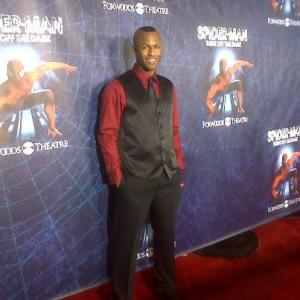 Emmanuel on the red carpet on the opening night of Spiderman Turn Off The Dark