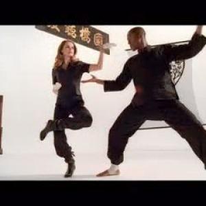 Emmanuel Brown and Keri Russell in a commercial for Covergirl.