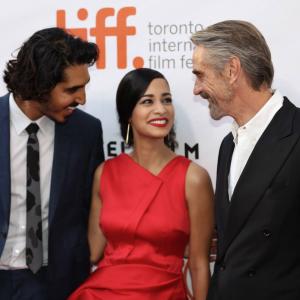 Dev Patel Devika Bhise and Jeremy Irons at the Toronto International Film Festival for the global premiere of The Man Who Knew Infinity