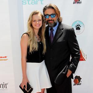 Brighid Fleming and Red Carpet LAs Roger Zamudio celebrate the 15th Annual Teen Choice Awards at the Celebrity Gift Lounge.
