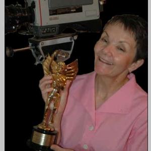 Bette Sharpe with Hermes Creative Award, Bette has won many accolades in her production work at CouryGraph Productions