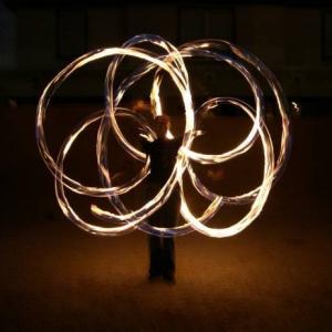 Joanna Ke performing poi fire spinning