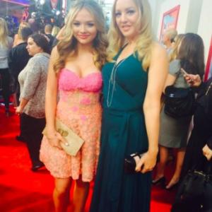Natalie Alyn Lind and Goldbergs costar Wendi McLendonCovey attend Blended premir