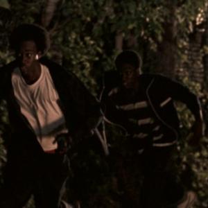 Movie Scene Redemption The Stan Tookie Williams Story  Michael A Amos running in an street alley