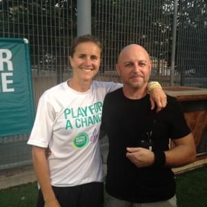 On the field with Olympic gold medalist and World Cup champion Brandi Chastain