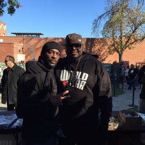 Ro Brooks and Q owner of WSHH the World Star SkidRow Christmas Giveaway