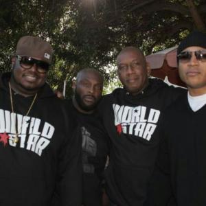Left to rightQ owner of WSHHRo Brooks Dimitri and LL Cool J  the World Star SkidRow Christmas Giveaway