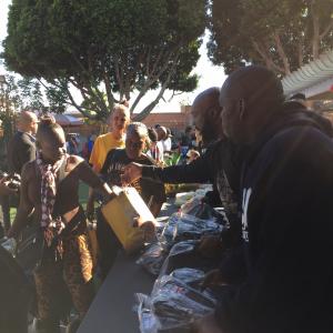 Ro Brooks helping out  the World Star SkidRow Christmas Giveaway