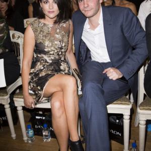 Sarah Greene and Daniel Bruhl attend the Marchesa show during London Fashion Week Spring Summer 2015 at on September 13 2014 in London England