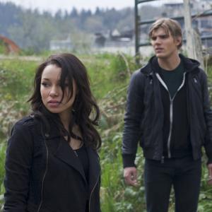 Still of Jessica Parker Kennedy and Chris Zylka in The Secret Circle 2011