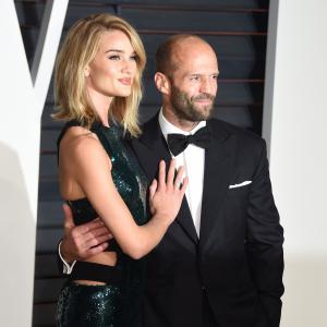 Jason Statham and Rosie HuntingtonWhiteley at event of The Oscars 2015