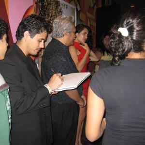 August evening cast autographing Jeremy Becerra Abel becerra Pedro Castaneda And Veronica Loren