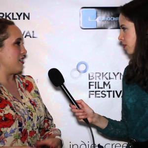 interviewing filmmaker Nicole Gomez Fisher at Brooklyn Film Festival