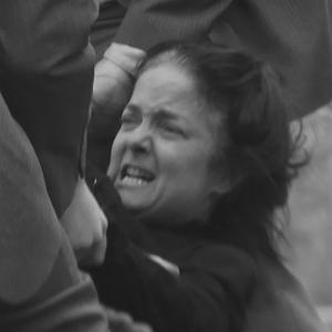 Alana Crow as Sarah Hurt in the Story of Hurt, being dragged to the asylum.
