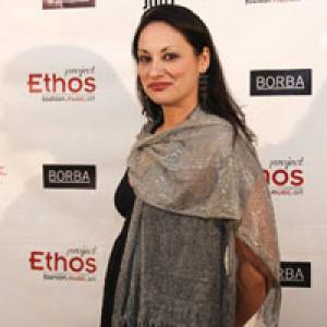 Stepping out in style, Elizabeth Regal aka Elizabeth Perez arrives at the Project Ethos 