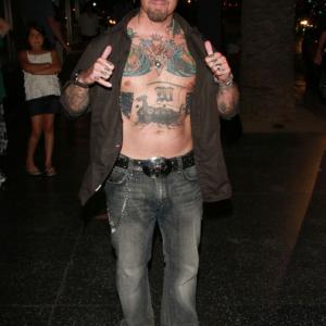 David Dossett bares his tattooed chest outside Katsuya in Hollywood
