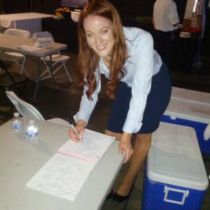 Signing script on set as Flight Attendant Kathy Jones on 