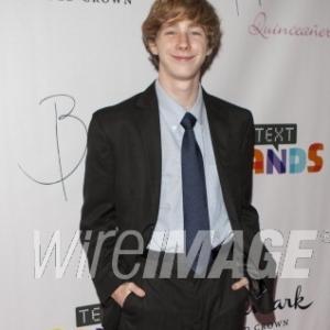 LOS ANGELES CA  OCTOBER 20 Joey Luthman attends Hallmark Gold Crown And Text Bands Celebrates Bella Thornes Quinceanera in honor of her 15th Birthday on October 20 2012 in Los Angeles California Photo by Michael BezjianWireImage