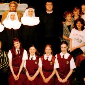 As Father Mullarkey in Once A Catholic