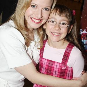 Meredith Patterson snaps an adorable pic with the show's youngest seasonal reveler, Melody Hollis.