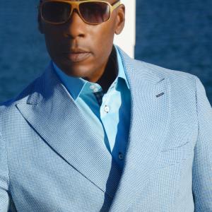 Image of Carlton  dressed in Gemelli clothing for his featured interview in FVM Global Magazine