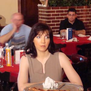 On set of If I Were Dictator. As 'Woman in Restaurant'.