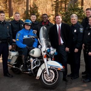 Patrick Jerome, Arthur Wahlberg and Boston Police officers on the set of Beyond Control