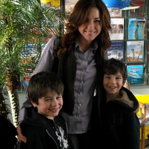 Michael (right) with Valin and actress Erin Karpluk on the set of 