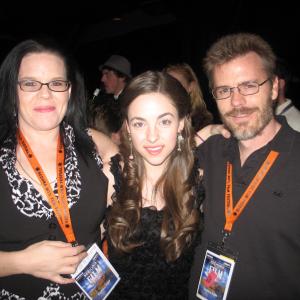 Miranda and I squishing Brittany Curran in 2009.