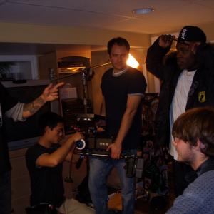 Image of a behind the scenes shot of the film 