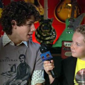 Disneys Really Short Report The Jonas Brothers on set being interviewed by Jacob Hays as Sonny Raines
