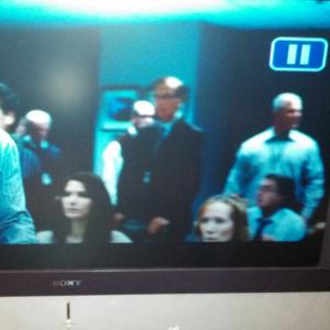 Screen shot of 'Man of Steel.' Jennifer sitting in right corner of frame.