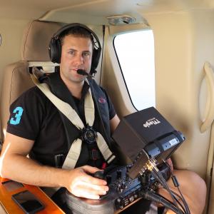 Blair Monk filming with the GSS C520 and Red Dragon on the EC135