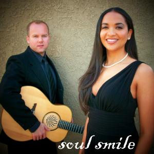 Oya with world renowned finger pick style acoustic guitarist JSE  Together Oya and JSE are Soul Smile