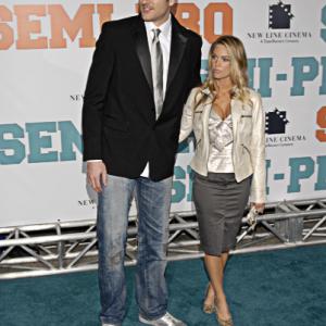 Peter Cornell and guest attend the Semi-Pro premier in Los Angeles