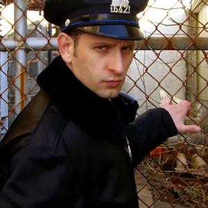 Damien Colletti as Officer Bruno in Law Abiding Citizen