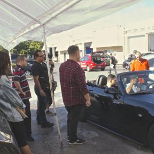 Filmmaker Eddie Mariano directs Alberto Delgado Jr as picture car gets ready