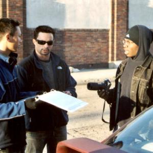 On set of 1 roll of film Sokhan Sar Director and First A.D. CJ Johnson discuss with lead actor Tyler B about the days approach