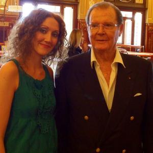 Actress Charlotte Milchard and actor Sir Roger Moore at Casino Royale during the 53rd Monte Carlo TV Festival in Monaco