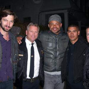 Tony Senzamici as Capt Jack Malatesta with series regular Michiel Huisman as Sonny Director Anthony Hemingway and 2 of New Orleans Finest Police Officers Scott Boyington  Victor Campuzano on the set of the HBO series Treme