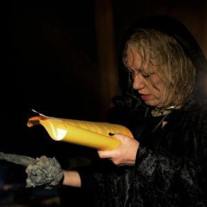 Jamie Newell checks her lines (incantation) as the evil Devilla in Teller Of Tales-A Fib Fit For A King