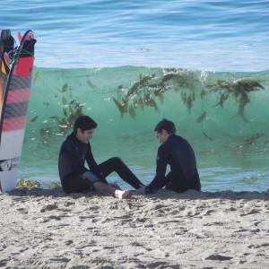 Let Go: Surfer friends enjoy the beach