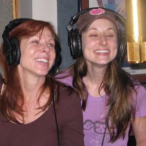 Kimberly Durrett as the speaking and singing voice and puppeteer of the pink monster Kiki in Kiddle Karoos Monster House Party puppet show Here pictured with the shows creator Lisa Clyde while recording the soundtrack version