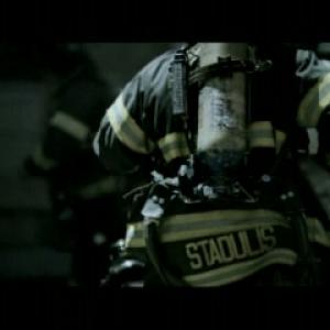 A still of Christopher Stadulis in a PSA for The Police and Firemans Widows and Childrens Fund