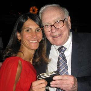 Sharon Abella poses with investor, Warren Buffett at the 